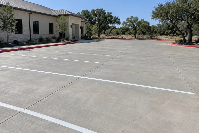 Concrete Parking Lots in Waco, TX, example photo: new concrete parking lot with painted stalls and a fire lane